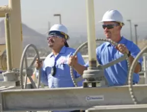 Veolia operators managing equipment at Rialto Water Services.