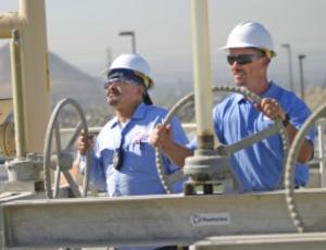 Veolia operators managing equipment at Rialto Water Services.