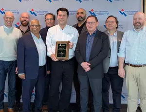 Veolia Canada poses with award from Water Environment Association of Ontario