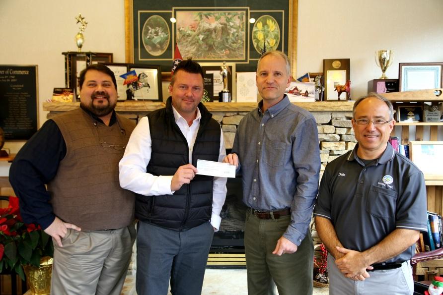 Gatlinburg Relief Fund Gatlinburg, TN receives a donation from Veolia to its relief fund after a wildfire.